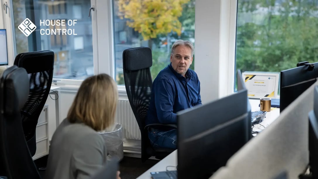 Man and woman talking in the office