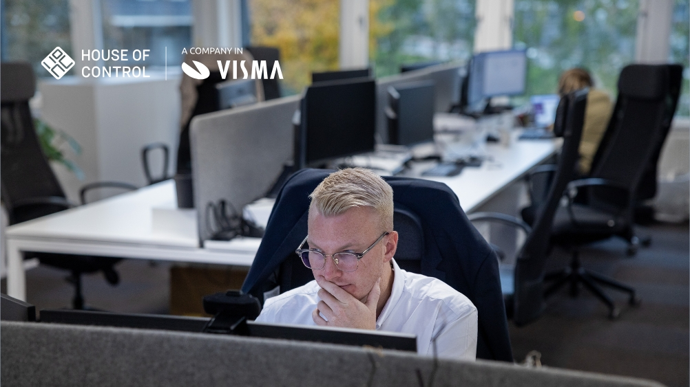 A man in the office looking concentrated